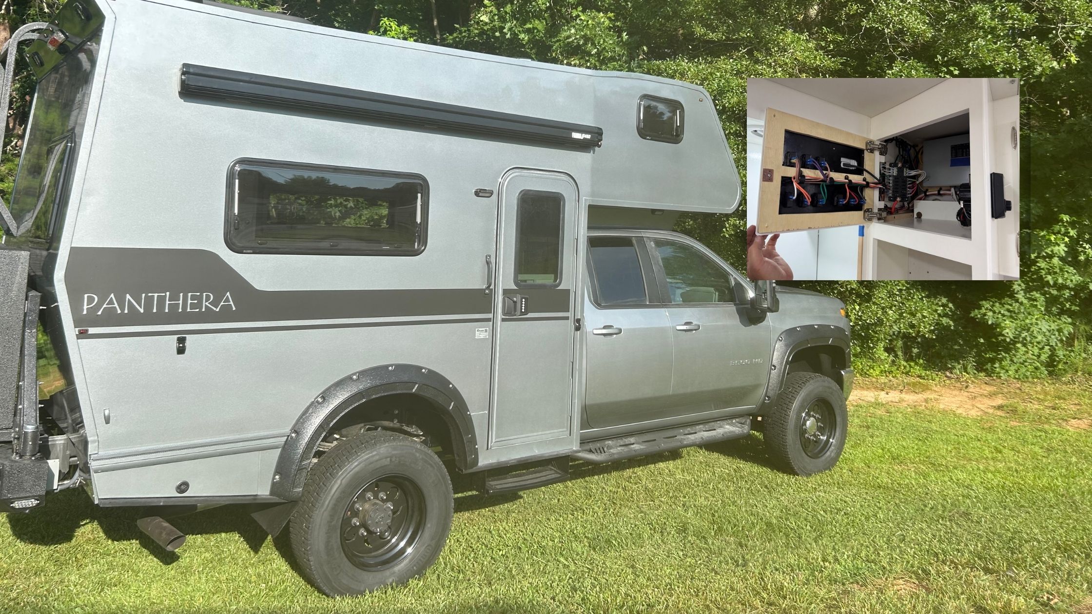 tiger-panthera-off-grid-electrical-system_main | Tiger Adventure Vehicles | Tiger Adventure Vehicles Tiger Panthera truck camper exterior with electrical system panel detail