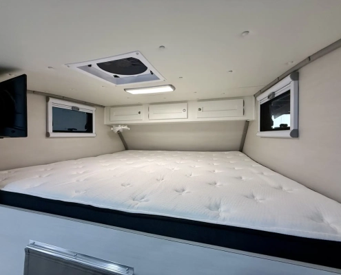 A king bed inside a Panthera 240